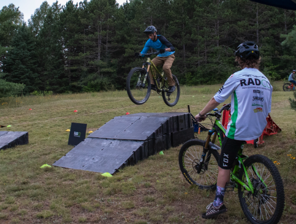 Mountain Bike Lessons Clinics big jump back